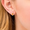 Thumbnail Image 1 of Oval Citrine and 1/10 CT. T.W. Diamond Frame Stud Earrings in 10K Gold
