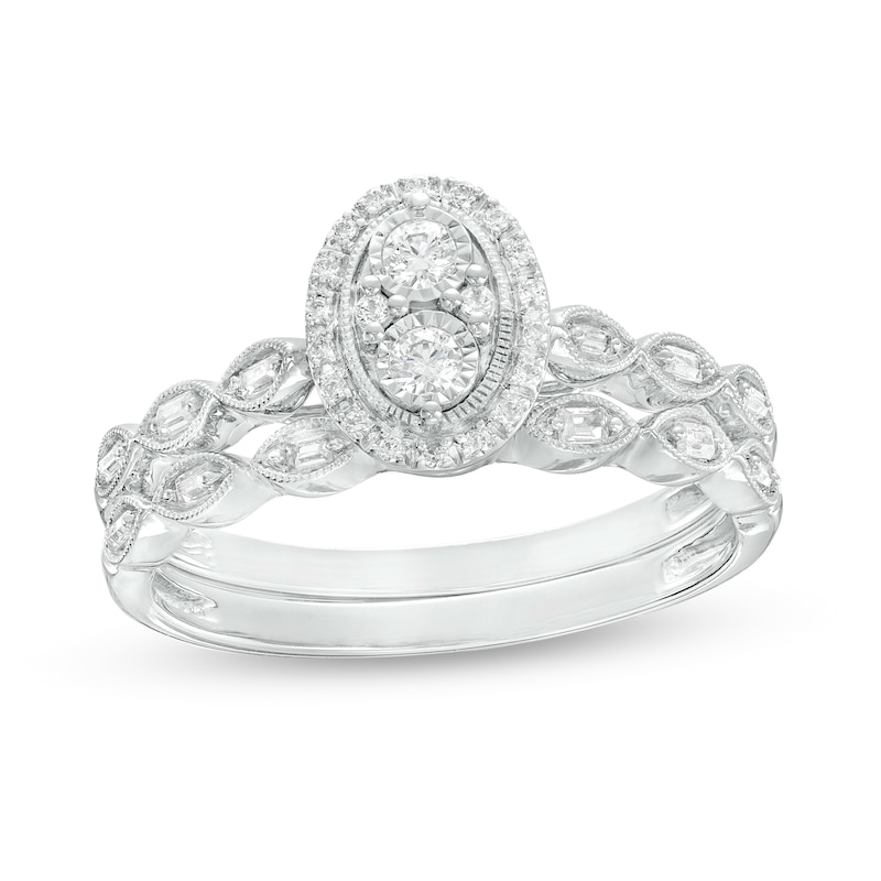 1/4 CT. T.W. Oval-Shaped Multi-Diamond Scallop Shank Vintage-Style Bridal Set in Sterling Silver