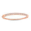 Thumbnail Image 0 of 1/2 CT. T.W. Baguette and Round Diamond Bangle in 10K Rose Gold