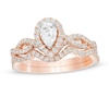 Thumbnail Image 0 of 1 CT. T.W. Pear-Shaped Diamond Frame Twist Split Shank Bridal Set in 14K Rose Gold