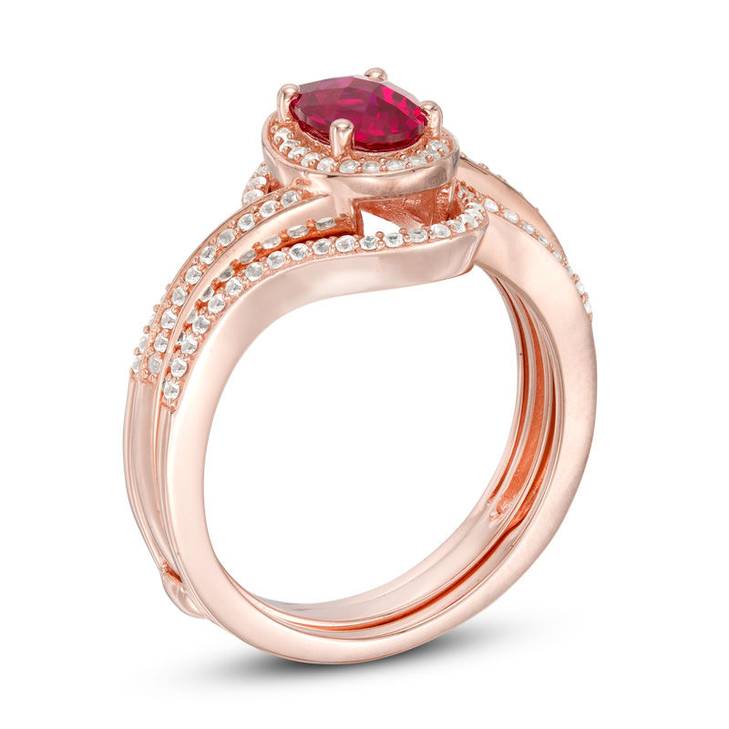 Oval Lab-Created Ruby and White Sapphire Swirl Frame Bridal Set in ...