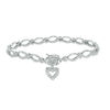 Thumbnail Image 0 of Diamond Accent Oval Link with Heart Charm Bracelet in Sterling Silver - 7.25"