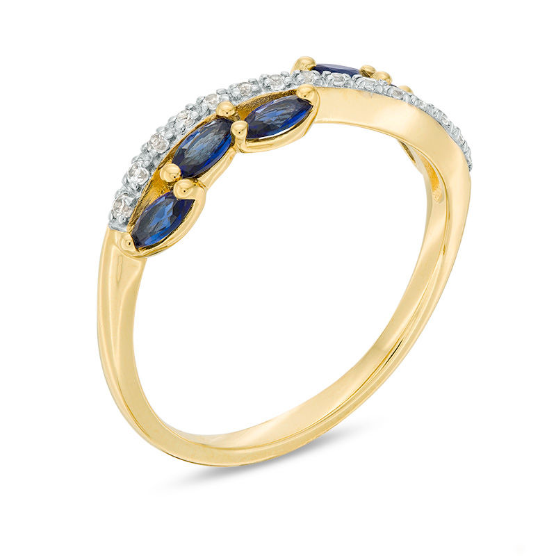 Marquise Blue Sapphire and 1/15 CT. T.W. Diamond Swirl Ribbon Ring in ...