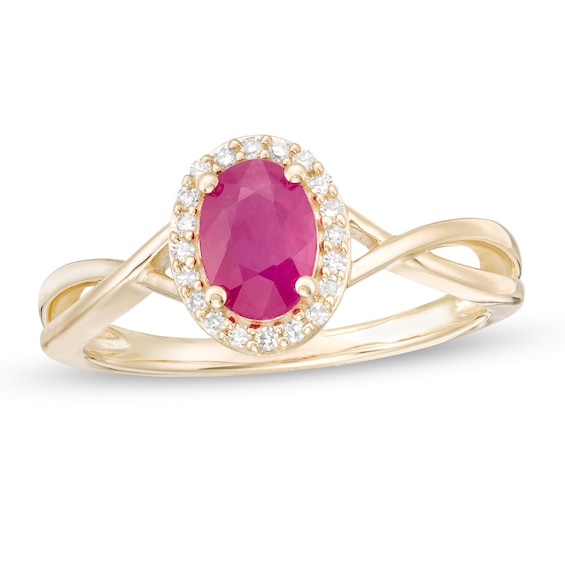 Oval Ruby and 1/15 CT. T.w. Diamond Frame Twist Shank Ring in 10K Gold